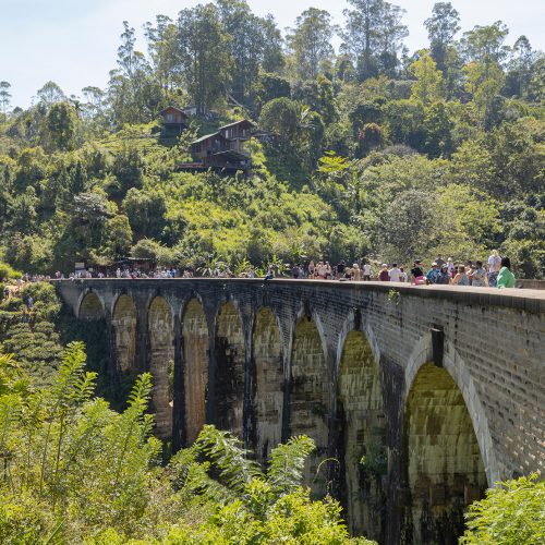 Ella, February 8, 2024. Tourists visit Nine Arch Bridge on the railway line between Kandy and Ella, Badulla District of Uva Province, Sri Lanka